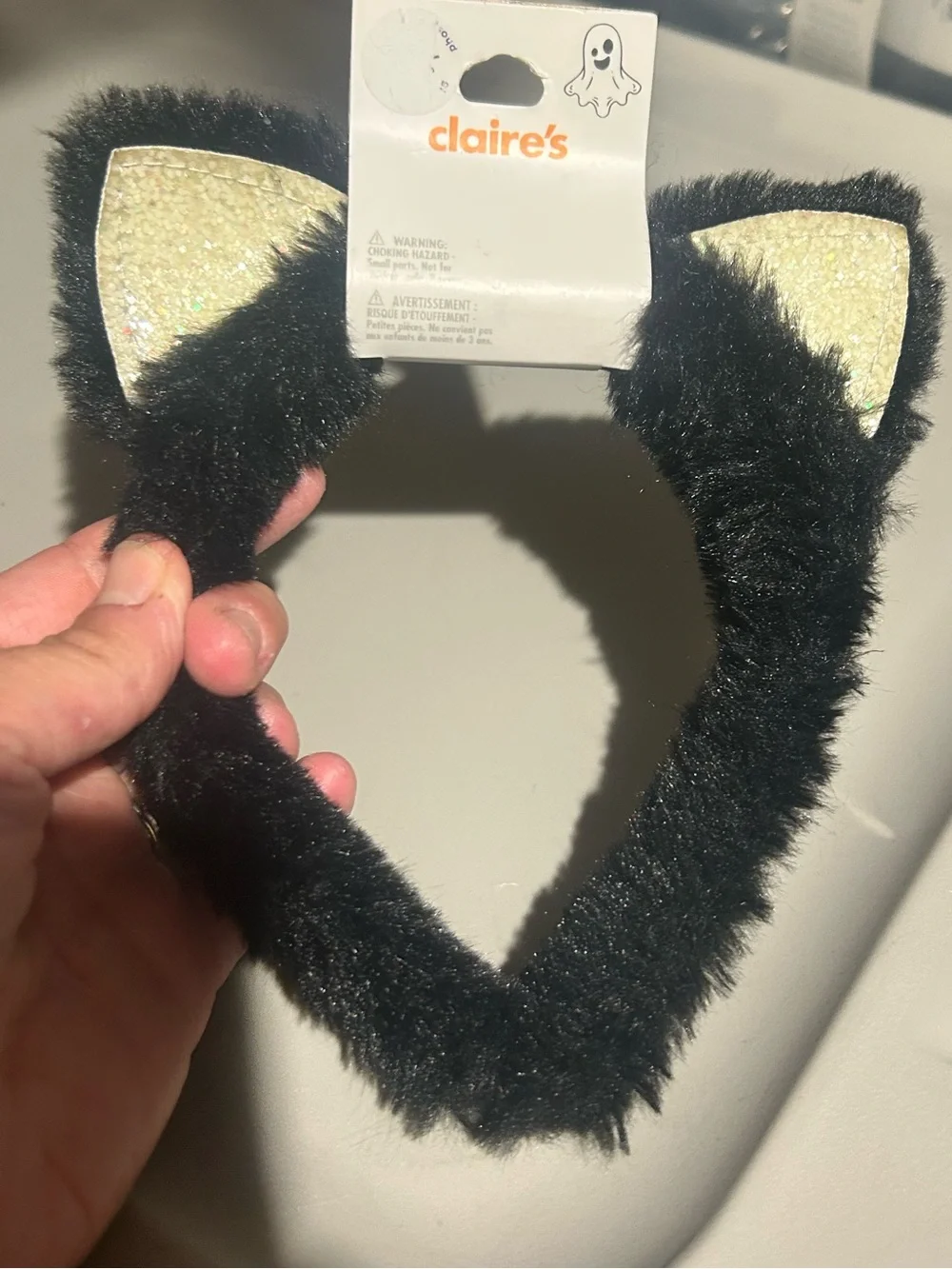 Claire's Black Fuzzy Cat Ear Headband with Gold Glitter Inner Ears